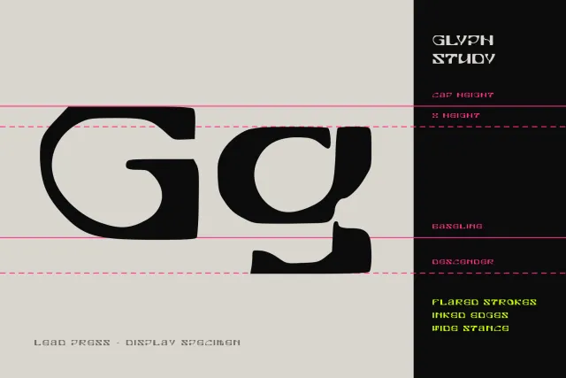 Lead Press glyph study of a large black Gg on guide lines for cap height, x height, baseline and descender