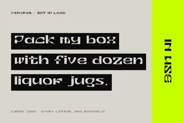 Lead Press pangram Pack my box with five dozen liquor jugs set in white on three black strips beside a lime bar