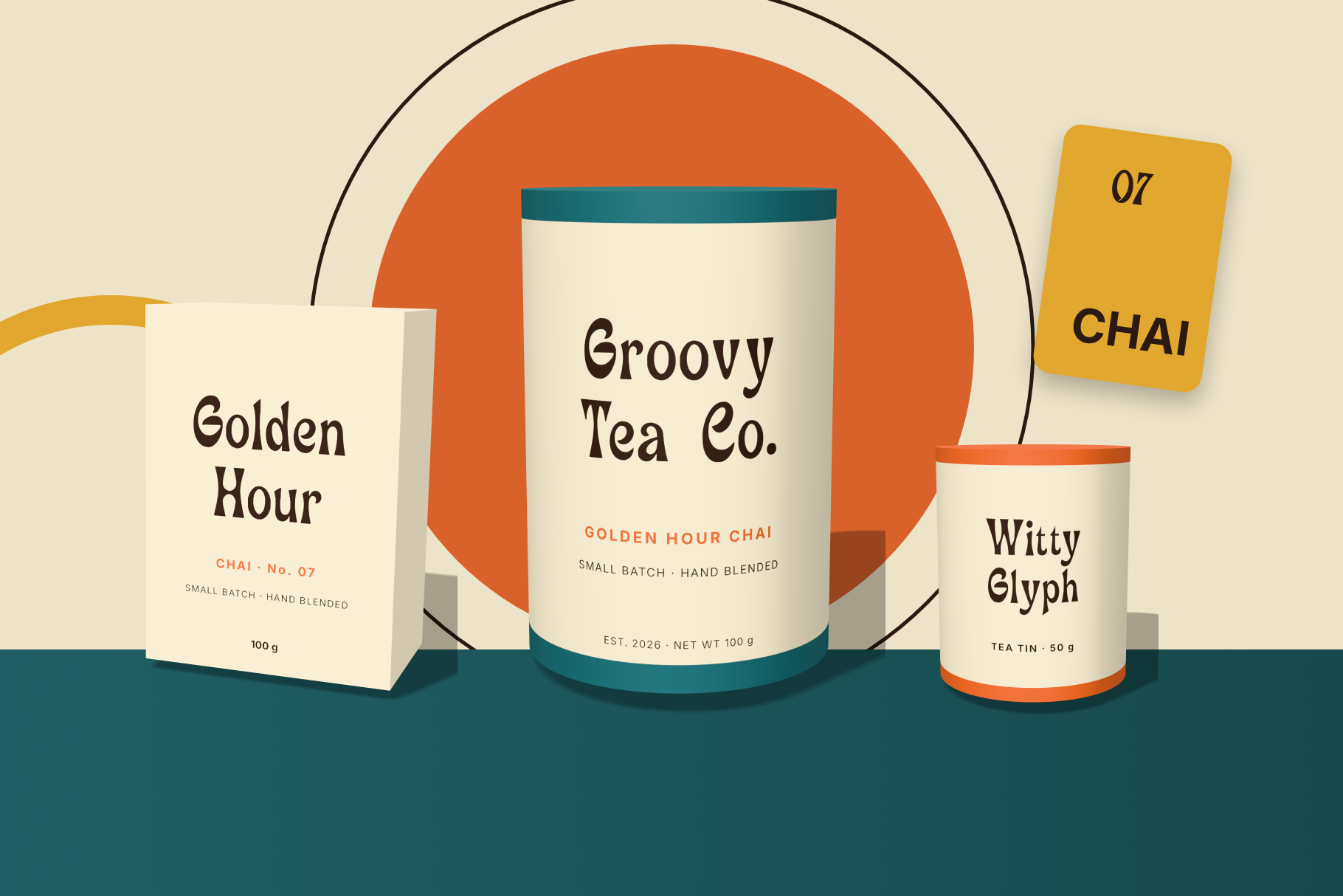 Witty Glyphの紅茶パッケージ。Golden Hourの箱、Groovy Tea Co.の缶、小さなWitty Glyphのティー缶