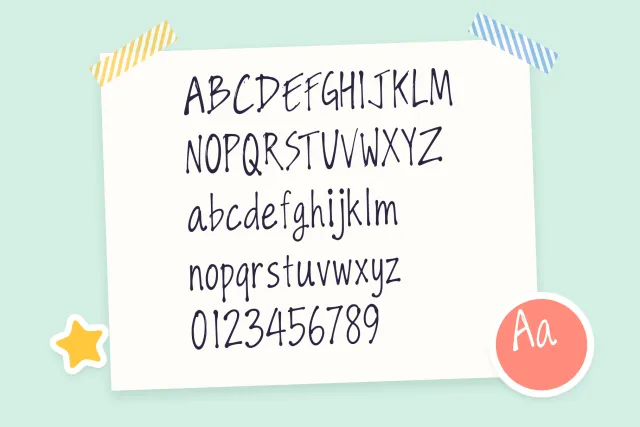The Wall font alphabet sheet: capitals, lowercase and digits 0 to 9 on taped paper with a star sticker